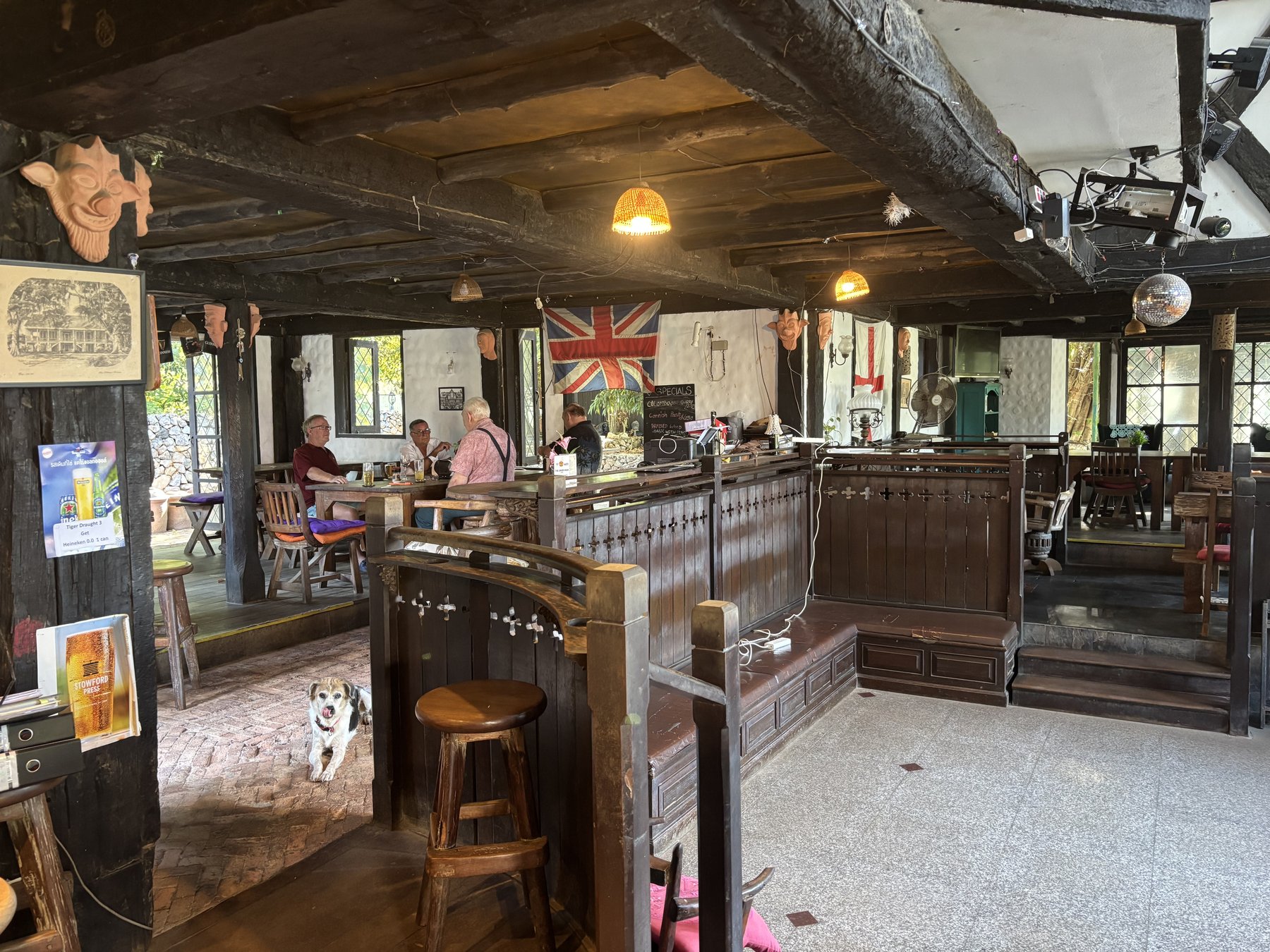 Inside The Green Man — oak beams, Union Jack and Tudor woodwork